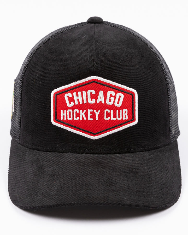 black CCM trucker hat with red Chicago Hockey Club patch embroidered on front - front lay flat