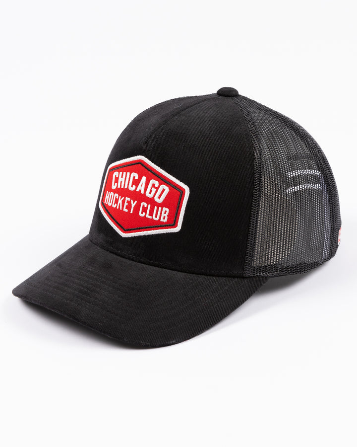 black CCM trucker hat with red Chicago Hockey Club patch embroidered on front - left angle lay flat