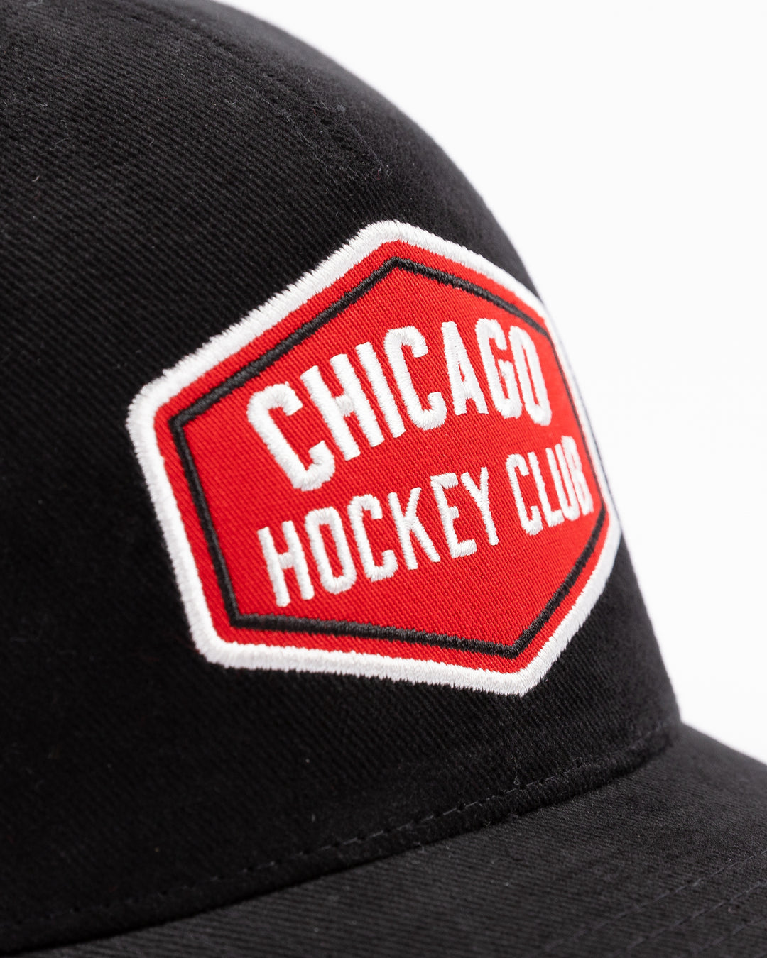 black CCM trucker hat with red Chicago Hockey Club patch embroidered on front - front detail patch lay flat