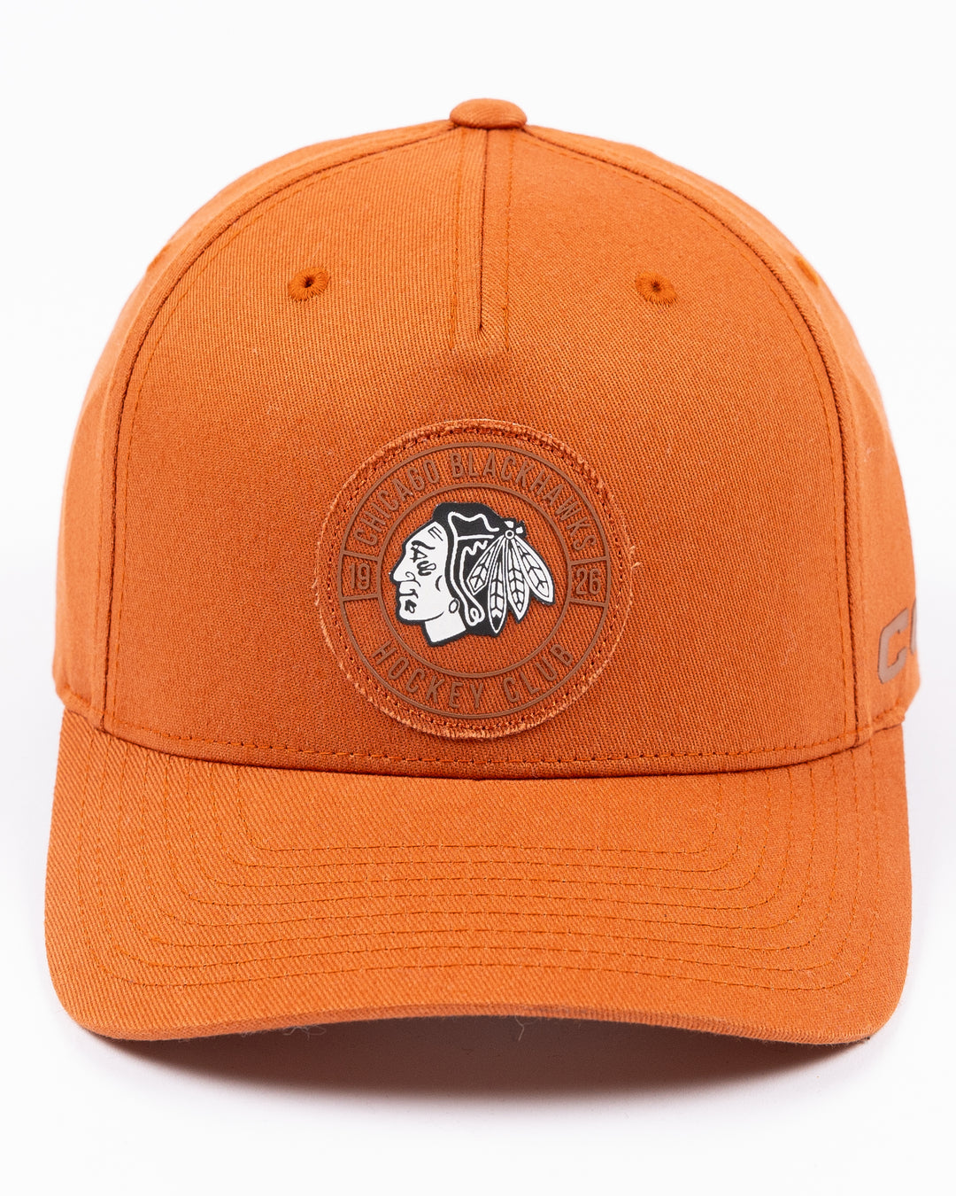 brown CCM adjustable hat with black and white Chicago Blackhawks primary logo surrounded by a tonal wordmark on the front - front lay flat