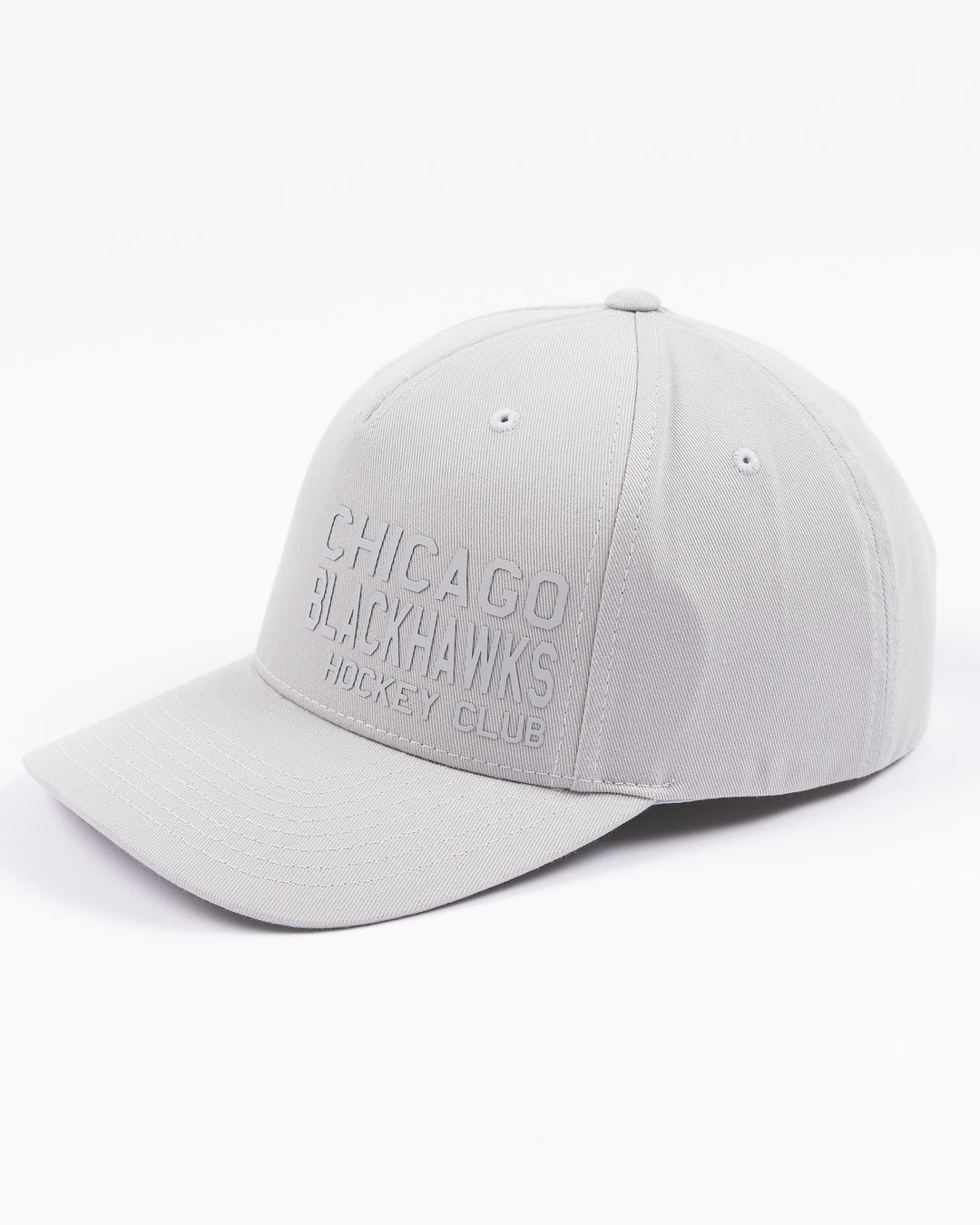 grey CCM adjustable hat with tonal Chicago Blackhawks Hockey Club wordmark on front - left angle lay flat