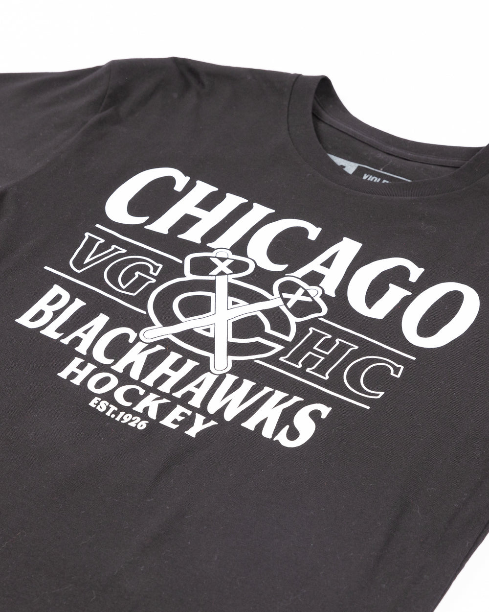 black short sleeve tee by VGHC with Chicago Blackhawks Hockey Club wordmark graphic on front - front detail  lay flat