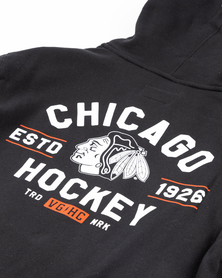 black VGHC lacer hoodie with Chicago Blackhawks branding on chest, left sleeve and back - back detail lay flat