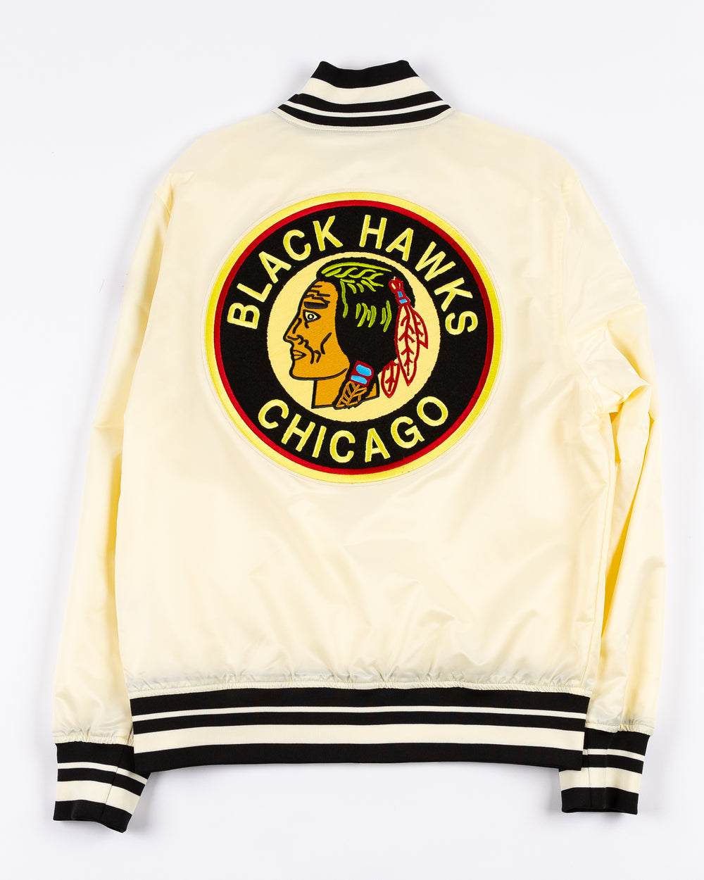 cream satin Pro Standard varsity jacket with vintage Chicago Blackhawks patches on shoulders, chest and back - back lay flat