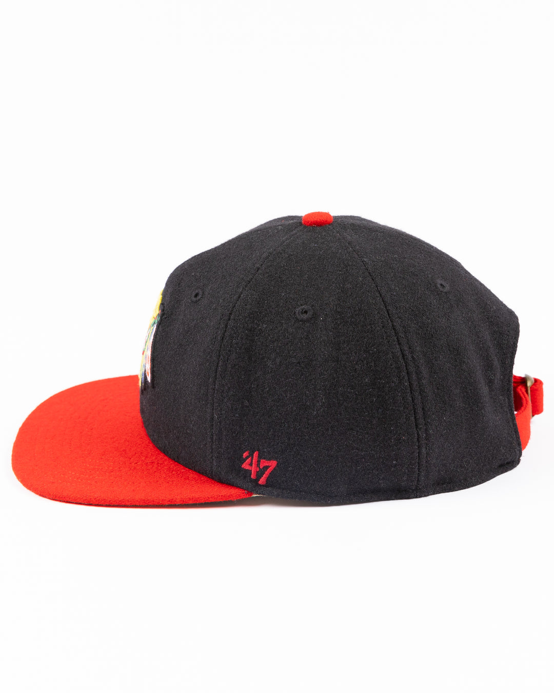 two tone black and red adjustable '47 brand hat with Chicago Blackhawks primary logo on front and CHI logo on right side - left side lay flat