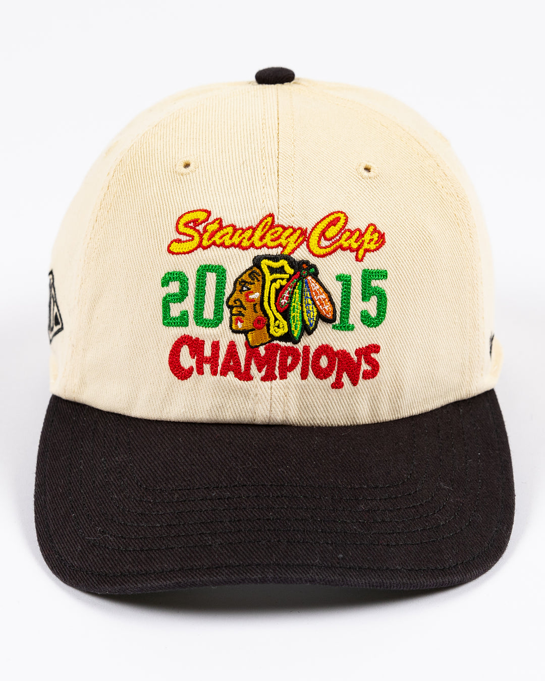 two tone cream and black '47 brand adjustable hat with stitched Chicago Blackhawks Stanley Cup Champions design on front - front lay flat