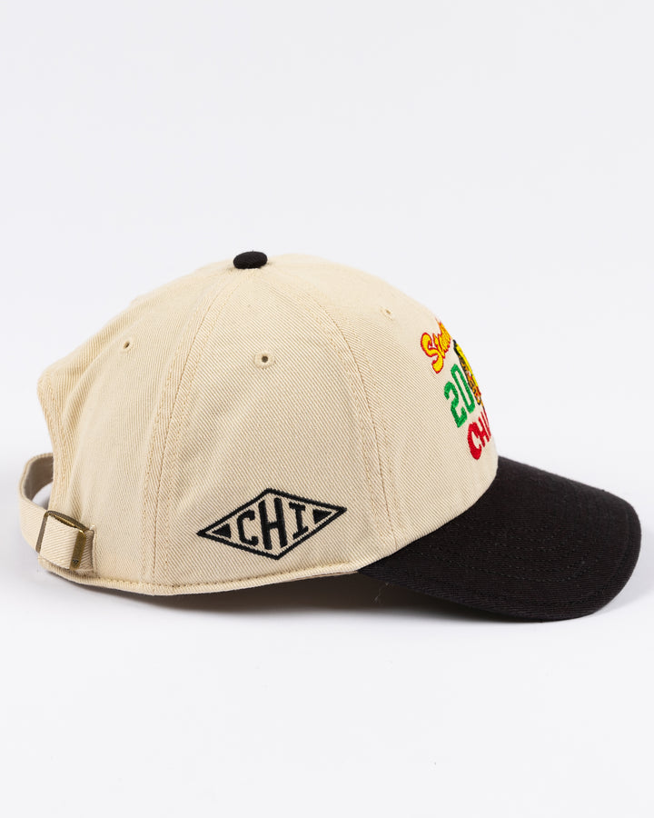 two tone cream and black '47 brand adjustable hat with stitched Chicago Blackhawks Stanley Cup Champions design on front - right side lay flat