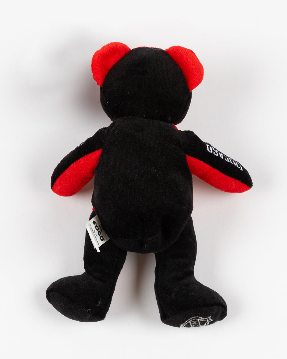 red and black plush bear with Chicago Blackhawks branding embroidered throughout - back lay flat