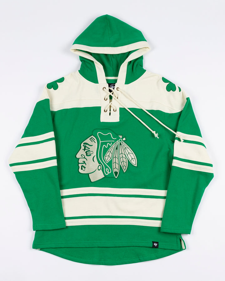 '47 brand green and white hockey inspired lace up hoodie with shamrocks on shoulders and Chicago Blackhawks primary logo on front and Connor Bedard name and number on back - front lay flat