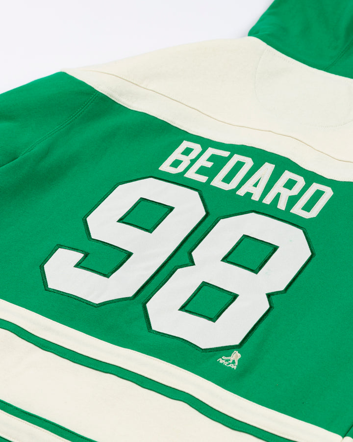 '47 brand green and white hockey inspired lace up hoodie with shamrocks on shoulders and Chicago Blackhawks primary logo on front and Connor Bedard name and number on back - back detail lay flat