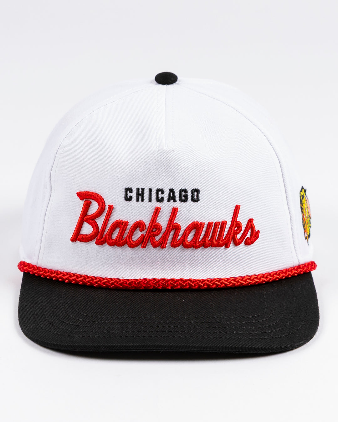 American Needle white rope snapback hat with Chicago Blackhawks wordmark on the front and primary logo on left side - front lay flat
