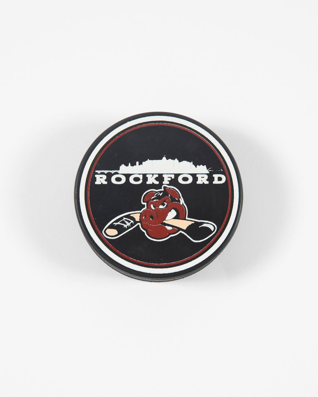 Black Rockford IceHogs hockey puck with skyline graphic - front lay flat