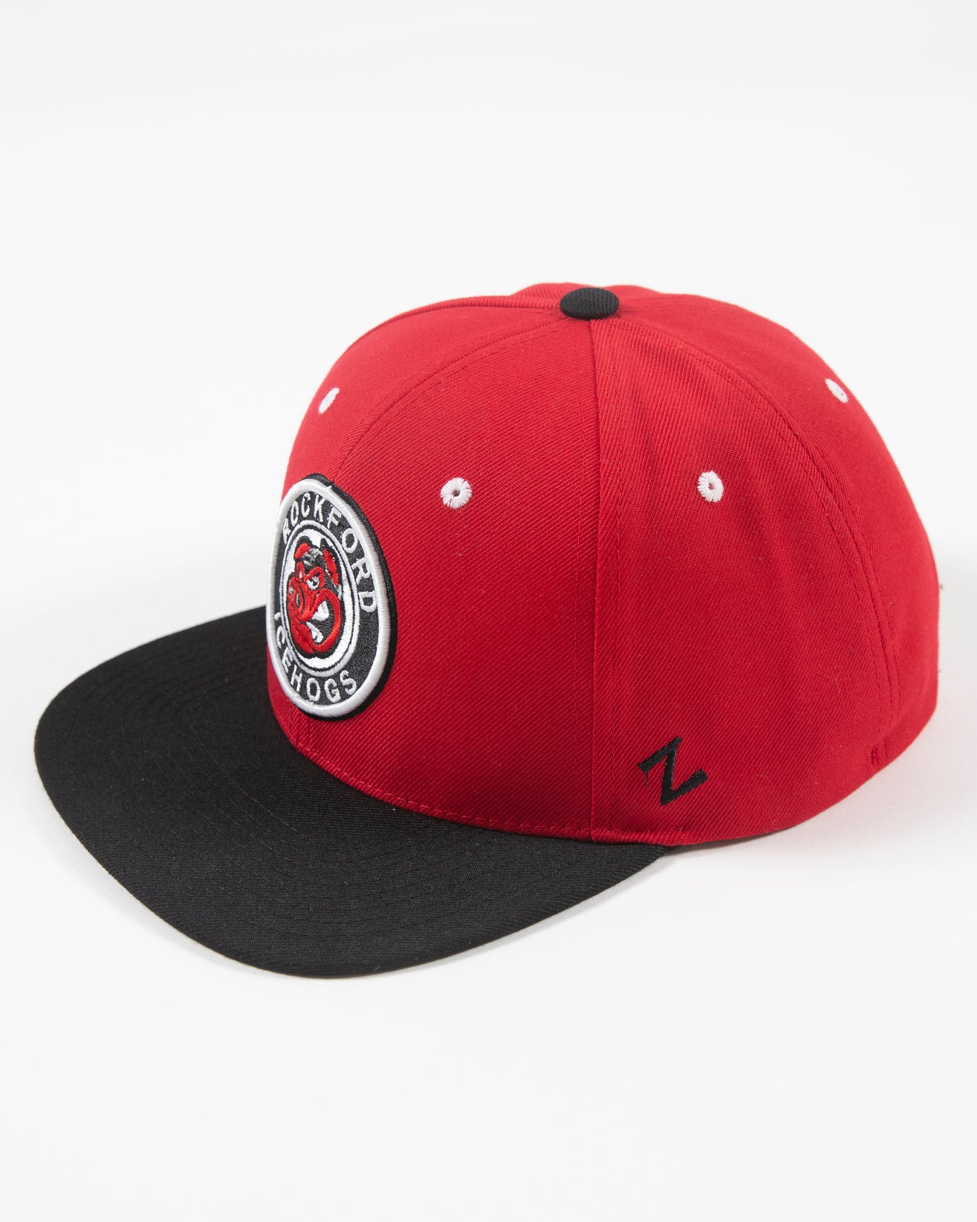 Black and red flat brim adjustable cap with Rockford IceHogs classic logo embroidered on front - left lay flat