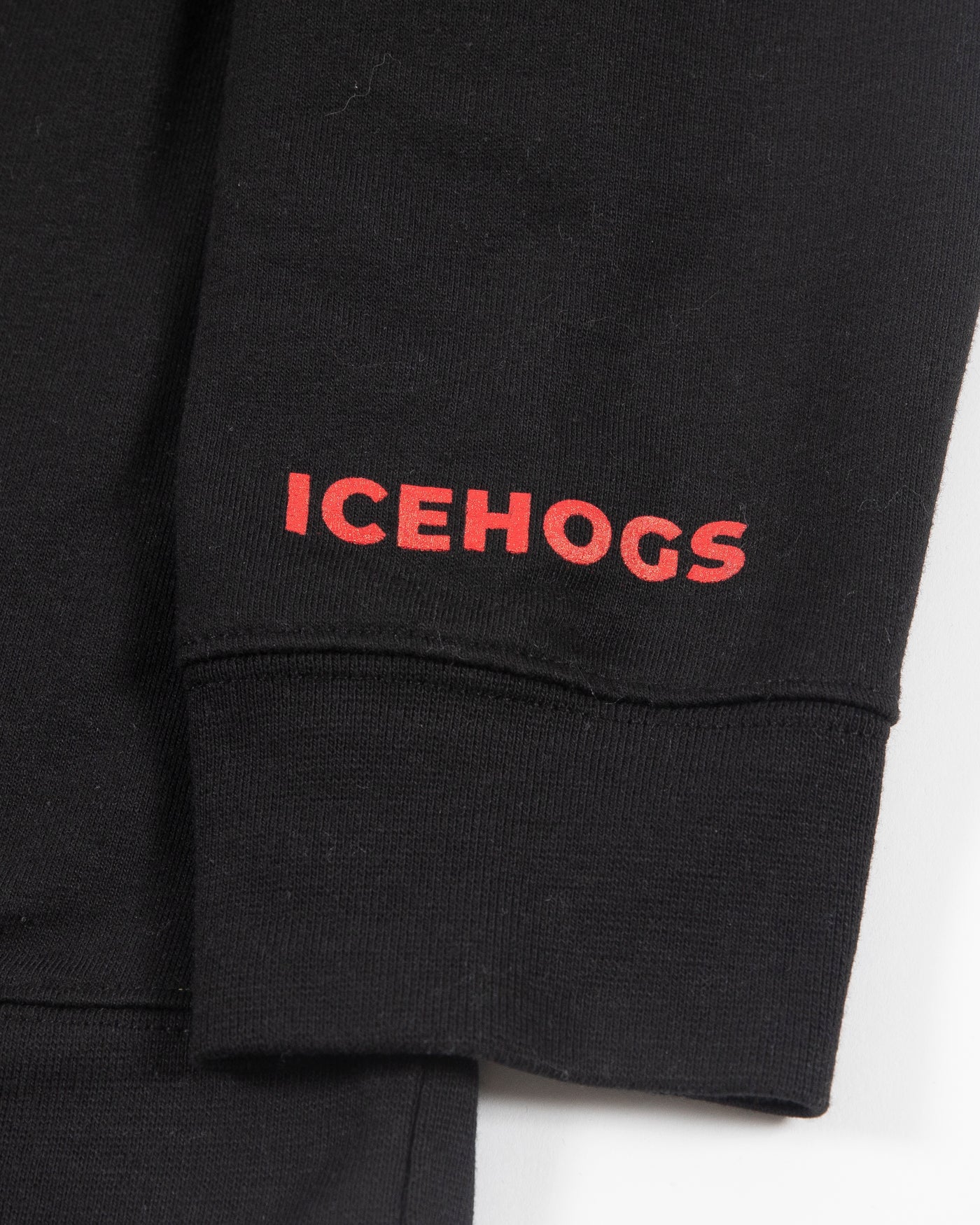 Black Rockford IceHogs crewneck with embroidered logo on left chest and embroidered wordmark on left cuff - alt detail lay flat