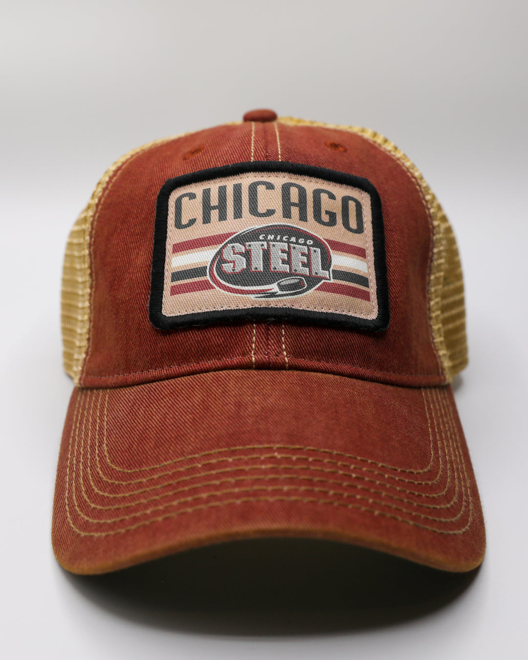 rust and tan adjustable trucker cap with Chicago Steel patch on front - front lay flat