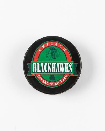 black green and red Chicago Blackhawks St. Patrick's Day puck - front lay flat