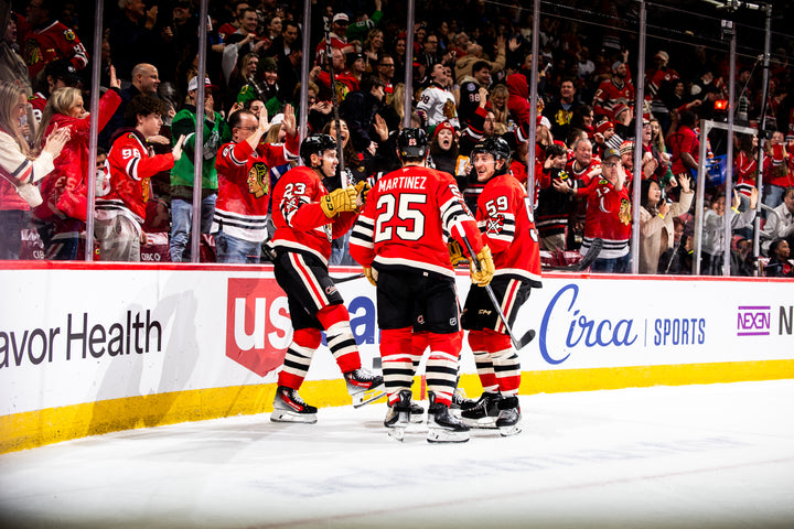 Chicago Blackhawks players Kurashev, Martinez and Bertuzzi celebrating Kurashev goal against Toronto Maple Leaves on February 23, 2025