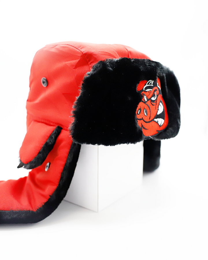 red and black Alpine winter hat with Rockford IceHogs Hammy logo on front furry cuff - right angle lay flat