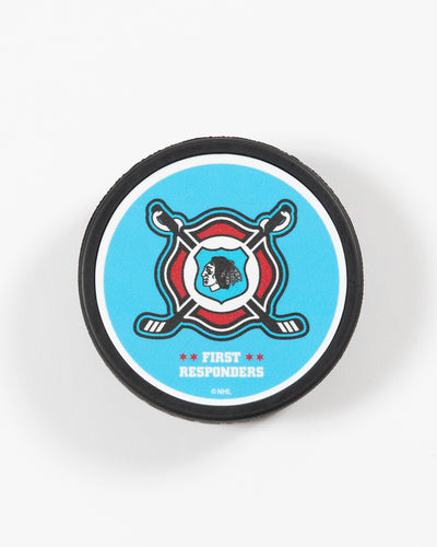 Chicago Blackhawks First Responders 23 black puck with logo detailing - birds eye view