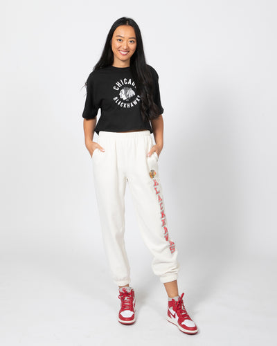 '47 brand white vintage wash jogger with Blackhawks name graphic along left leg - front view