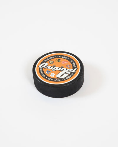 Mustang orange Original Six hockey puck with all six team logos - lay flat