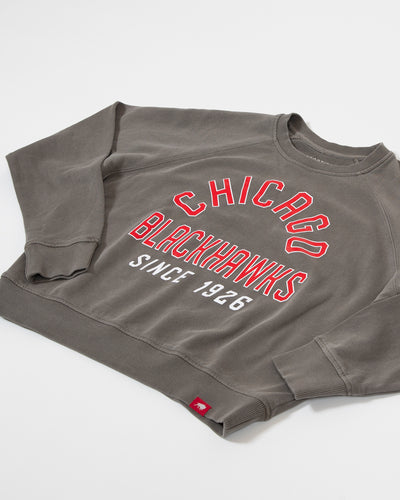 Sportiqe grey Chicago Blackhawks crewneck with Chicago Blackhawks Since 1926 wordmark across center chest - detail shot