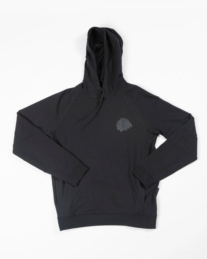 Black lululemon Chicago Blackhawks hoodie with tonal primary logo on left chest - front lay flat