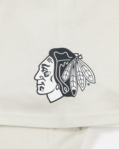 off white lululemon tee with tonal Chicago Blackhawks primary logo on left shoulder - detail lay flat 