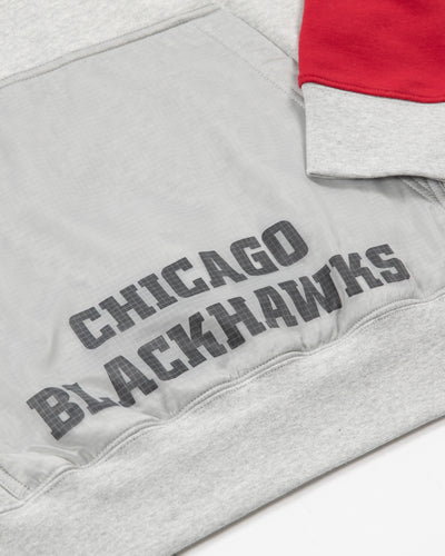 Colorblock Mitchell & Ness Chicago Blackhawks primary logo hoodie Chicago Blackhawks wordmark detail shot