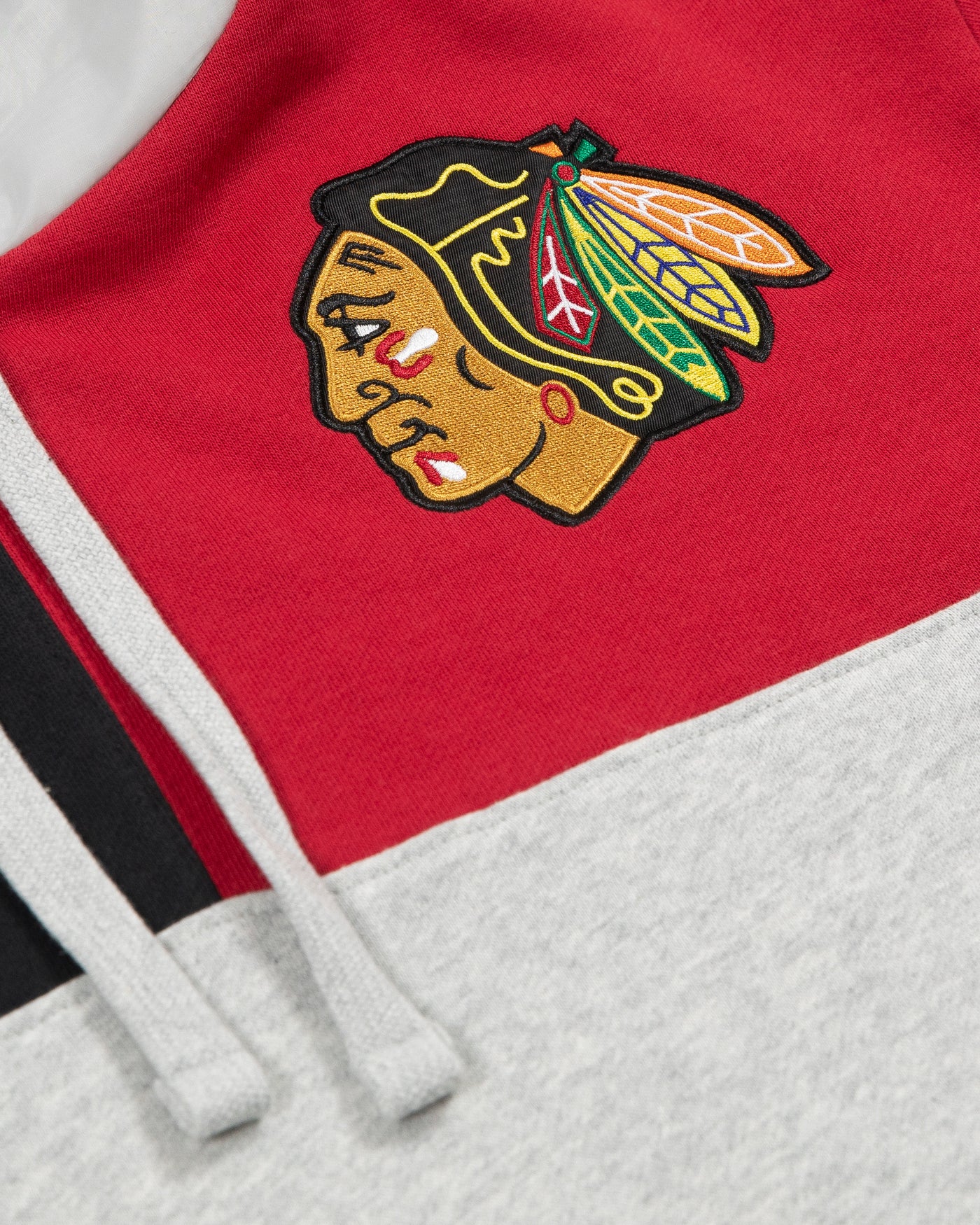 Colorblock Mitchell & Ness Chicago Blackhawks primary logo hoodie primary logo detail shot
