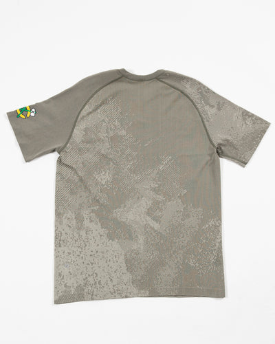 green patterned lululemon technical tee with secondary logo on left shoulder - back lay flat