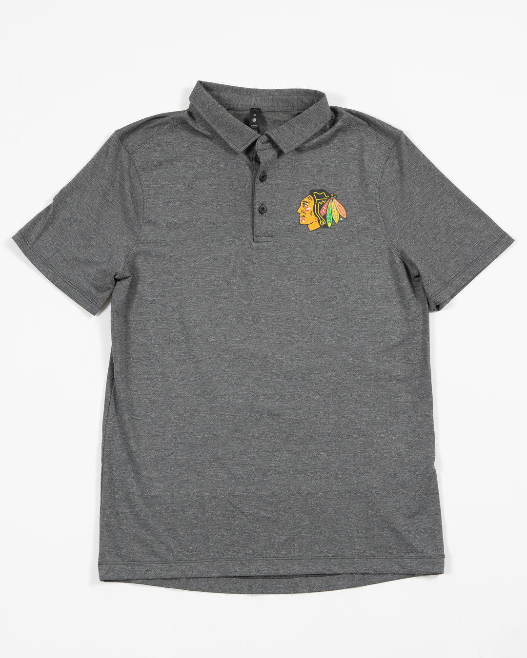 dark grey lululemon button up polo with primary logo on left chest - front lay flat