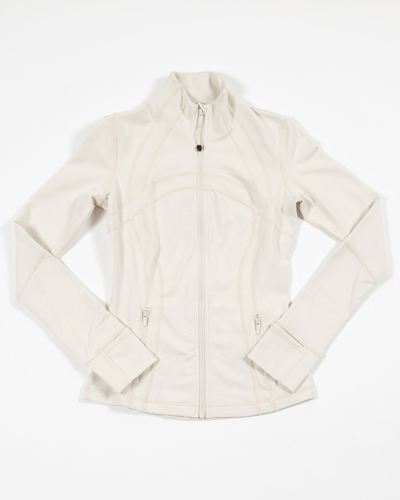 white define lululemon workout zip up jacket with primary logo - front lay flat