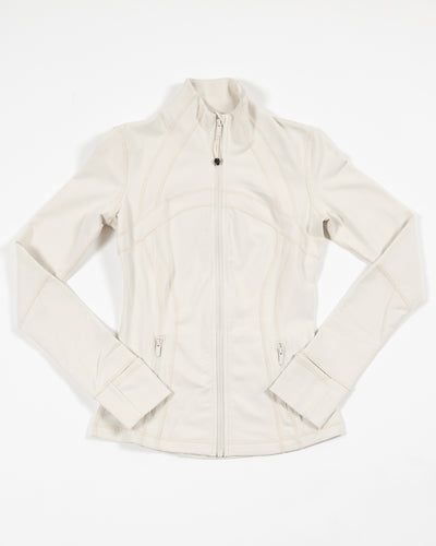 white define lululemon workout zip up jacket with primary logo - front lay flat
