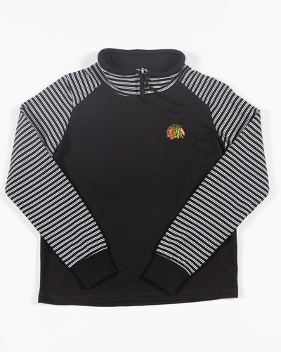 black and white striped Antigua zip up jacket with embroidered Chicago Blackhawks logo on left chest - front lay flat