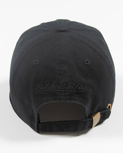 black adjustable cap with white and green Chicago Blackhawks secondary logo - back lay flat