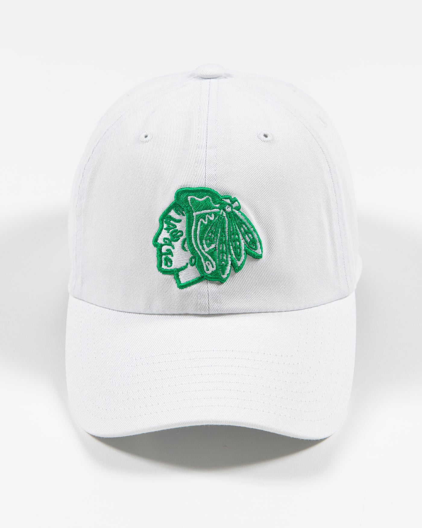 white adjustable cap with green Chicago Blackhawks primary logo - front lay flat