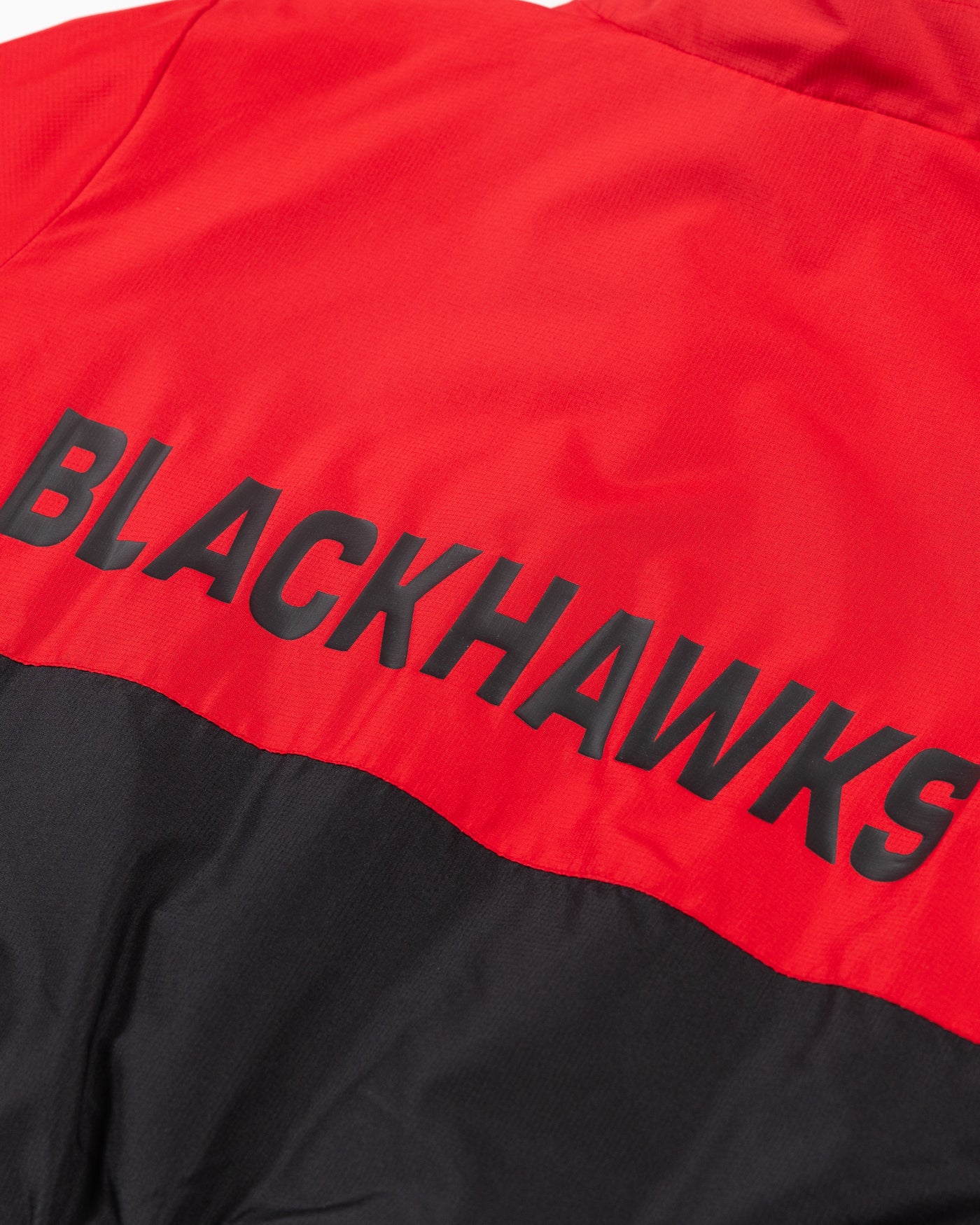 New Era red and black zip up cropped jacket with Chicago Blackhawks primary logo on left chest - back wordmark detail lay flat