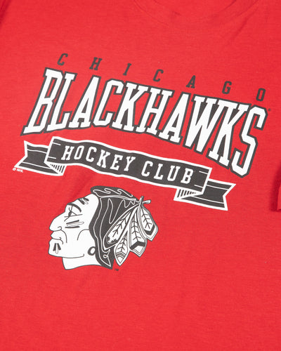adidas red tee with Chicago Blackhawks word graphic and primary logo on front chest - detail lay flat