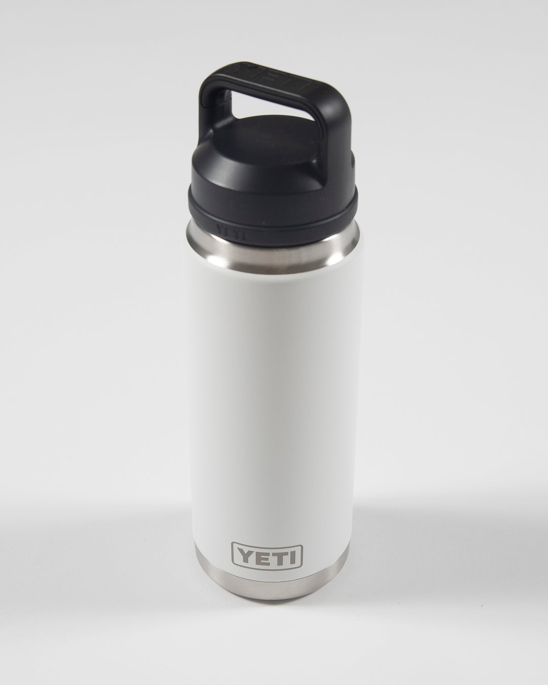 white YETI 26 oz rambler with tonal Chicago Blackhawks primary logo on front - back lay flat