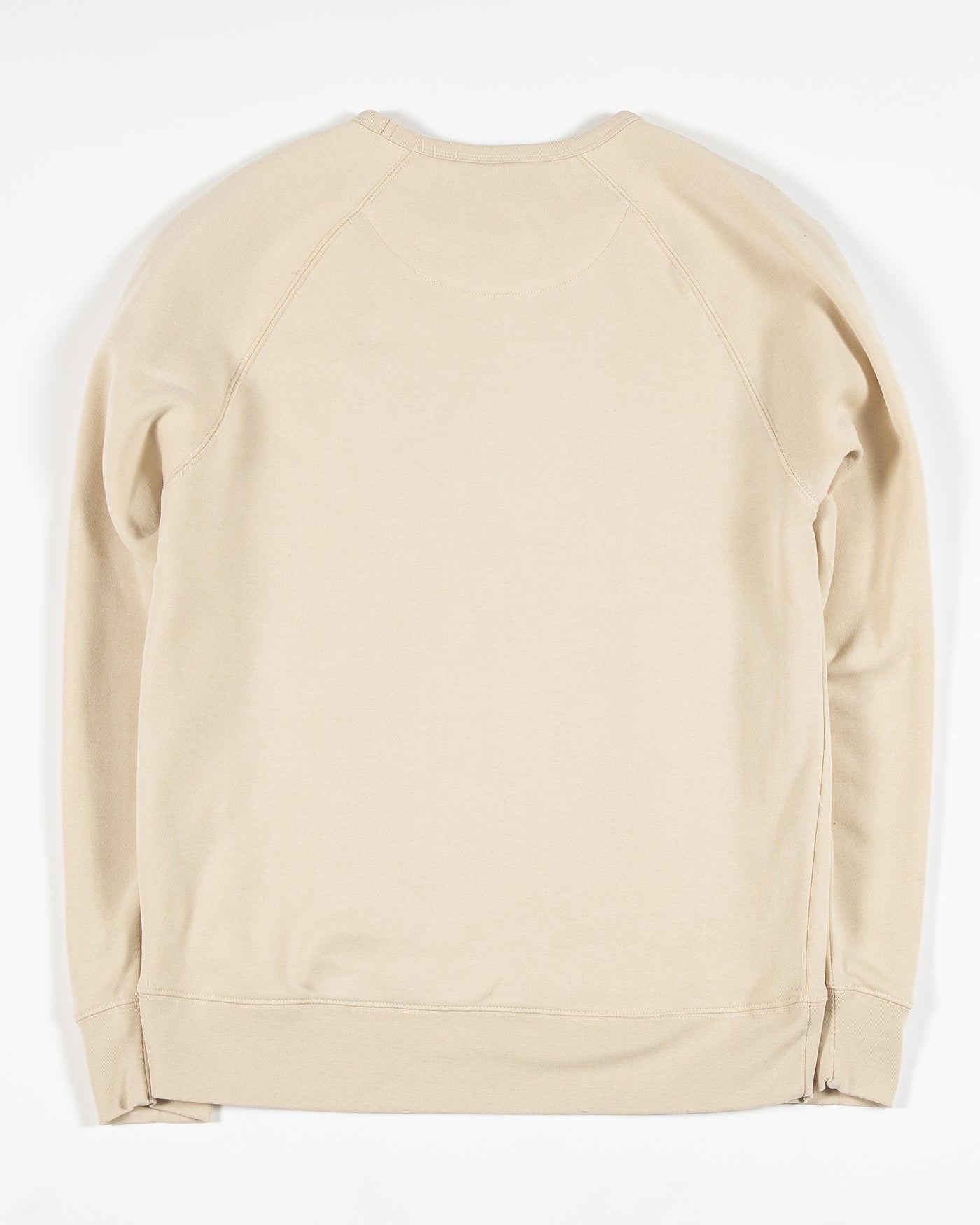 Off white colored crewneck with Chicago Blackhawks wordmark graphics in pride colorway along front chest and down left arm - back lay flat