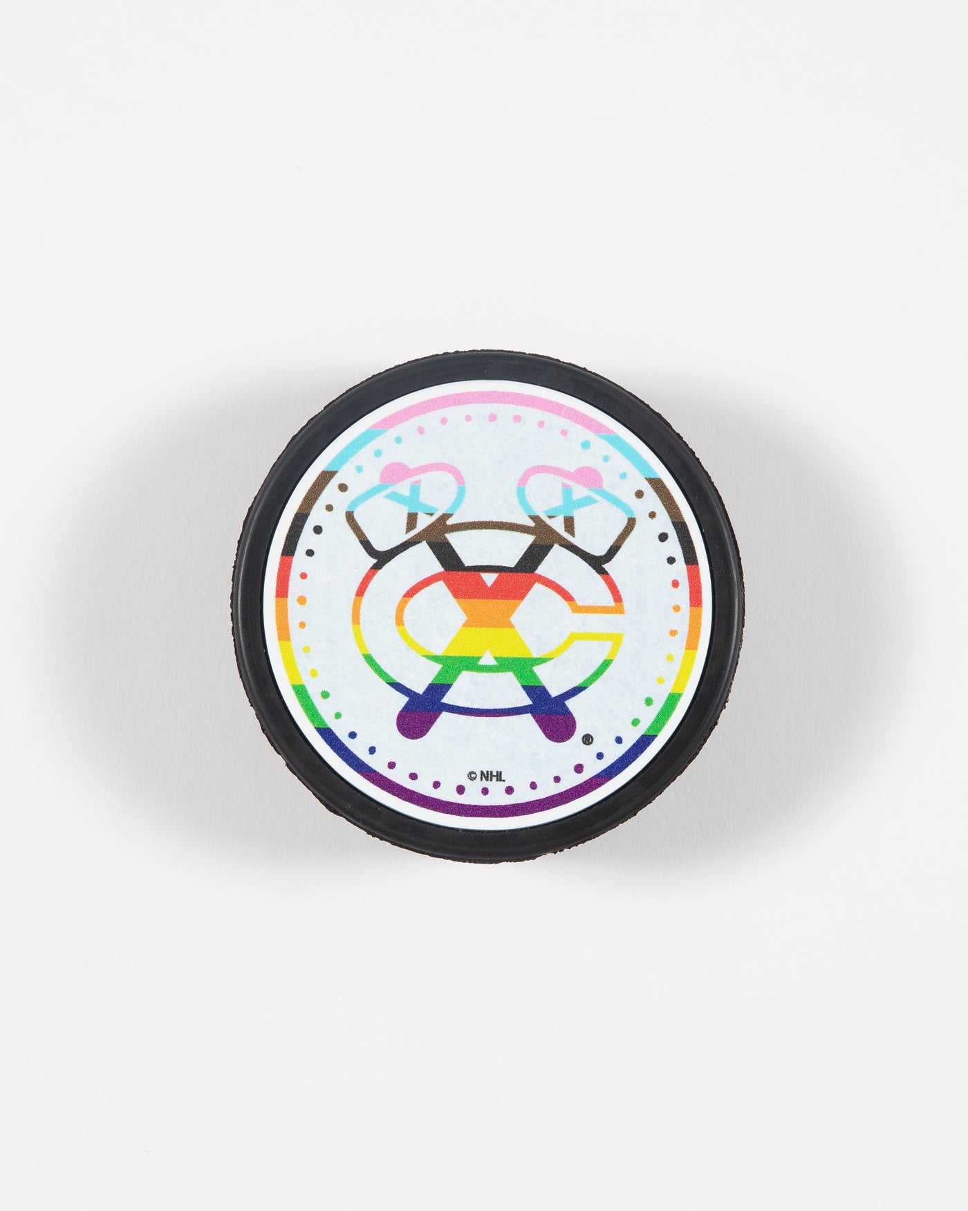 Puck with Chicago Blackhawks Secondary logo in Pride colorway - front lay flat