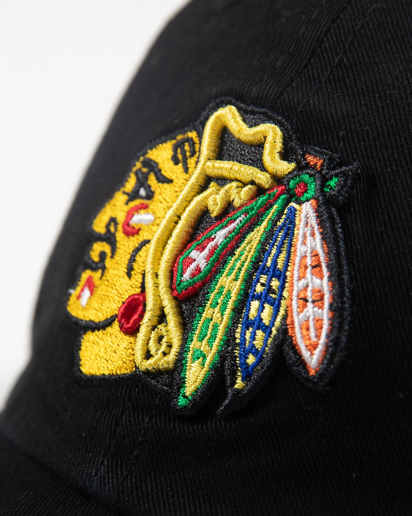 black '47 adjustable cap with embroidered Chicago Blackhawks primary logo on front - detail lay flat