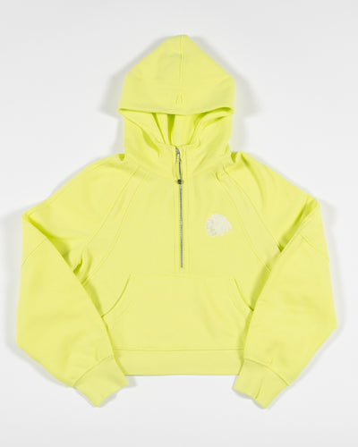 bright yellow lululemon half zip hoodie with Chicago Blackhawks logo embroidered on left chest - front lay flat