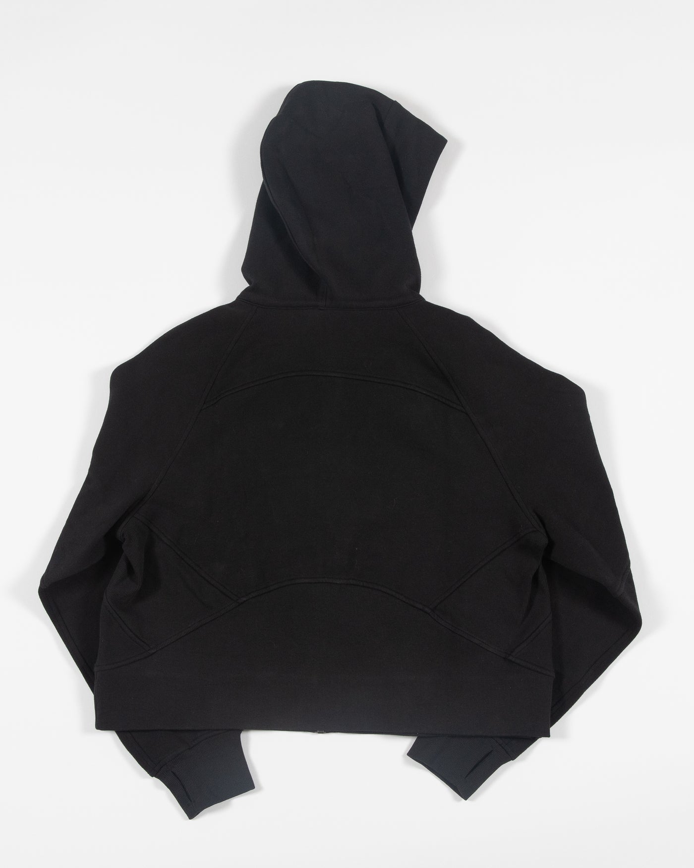 black oversized cropped lululemon hoodie with Chicago Blackhawks primary logo embroidered on left chest - back lay flat