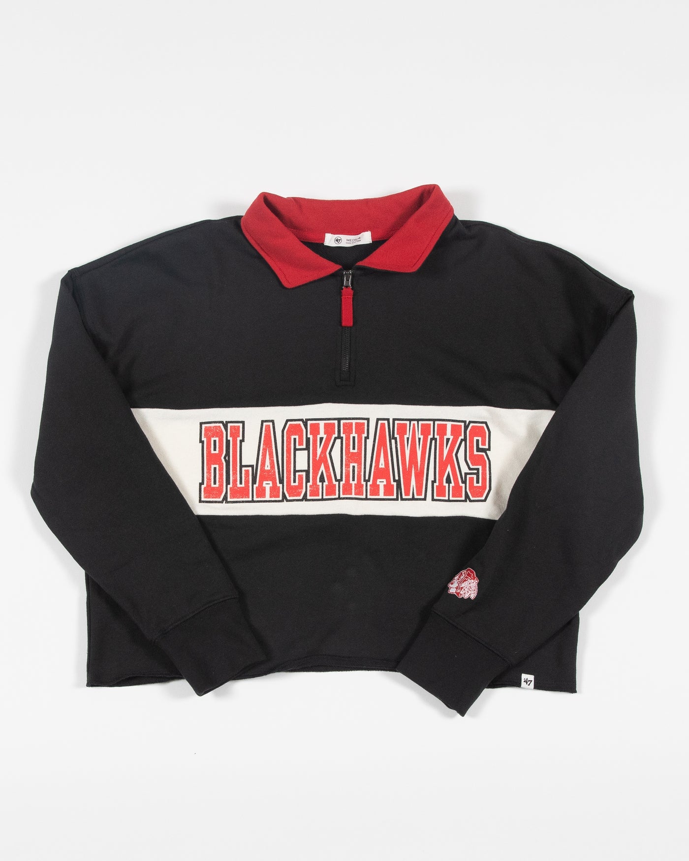 black '47 brand quarter zip with Chicago Blackhawks wordmark graphic across chest and primary logo on left sleeve - front lay flat