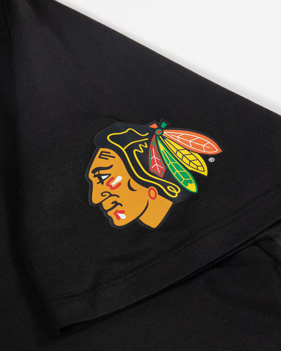 black lululemon tee with Chicago Blackhawks primary logo on left shoulder - detail lay flat