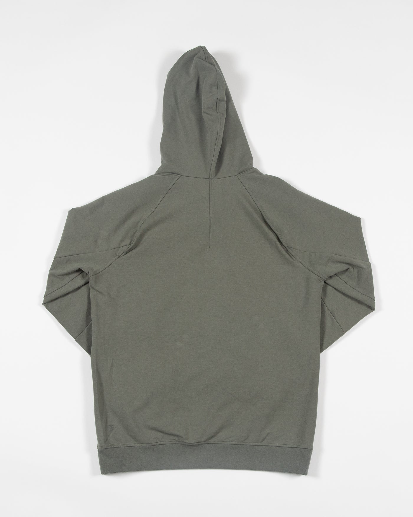 green lululemon hoodie with Chicago Blackhawks tonal primary logo on front left chest - back lay flat