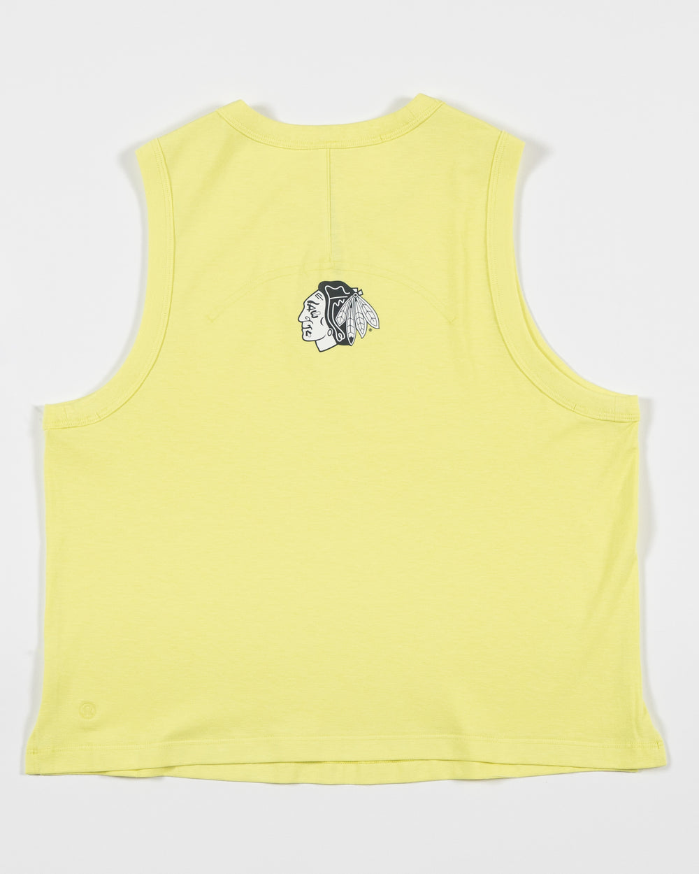 yellow lululemon tank top with Chicago Blackhawks logo on back - back lay flat