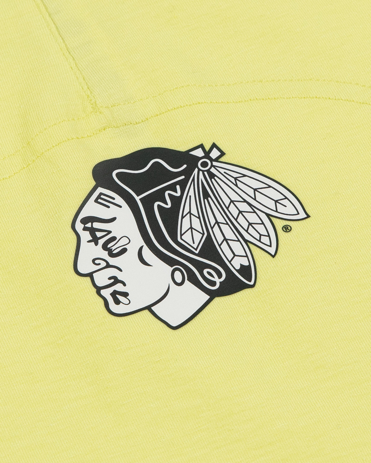 yellow lululemon tank top with Chicago Blackhawks logo on back - detail lay flat